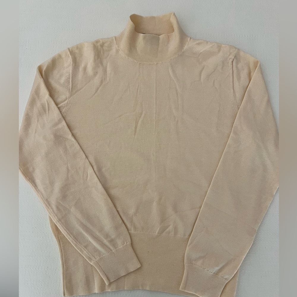 Jcrew knit turtle neck sweater in butter yellow.